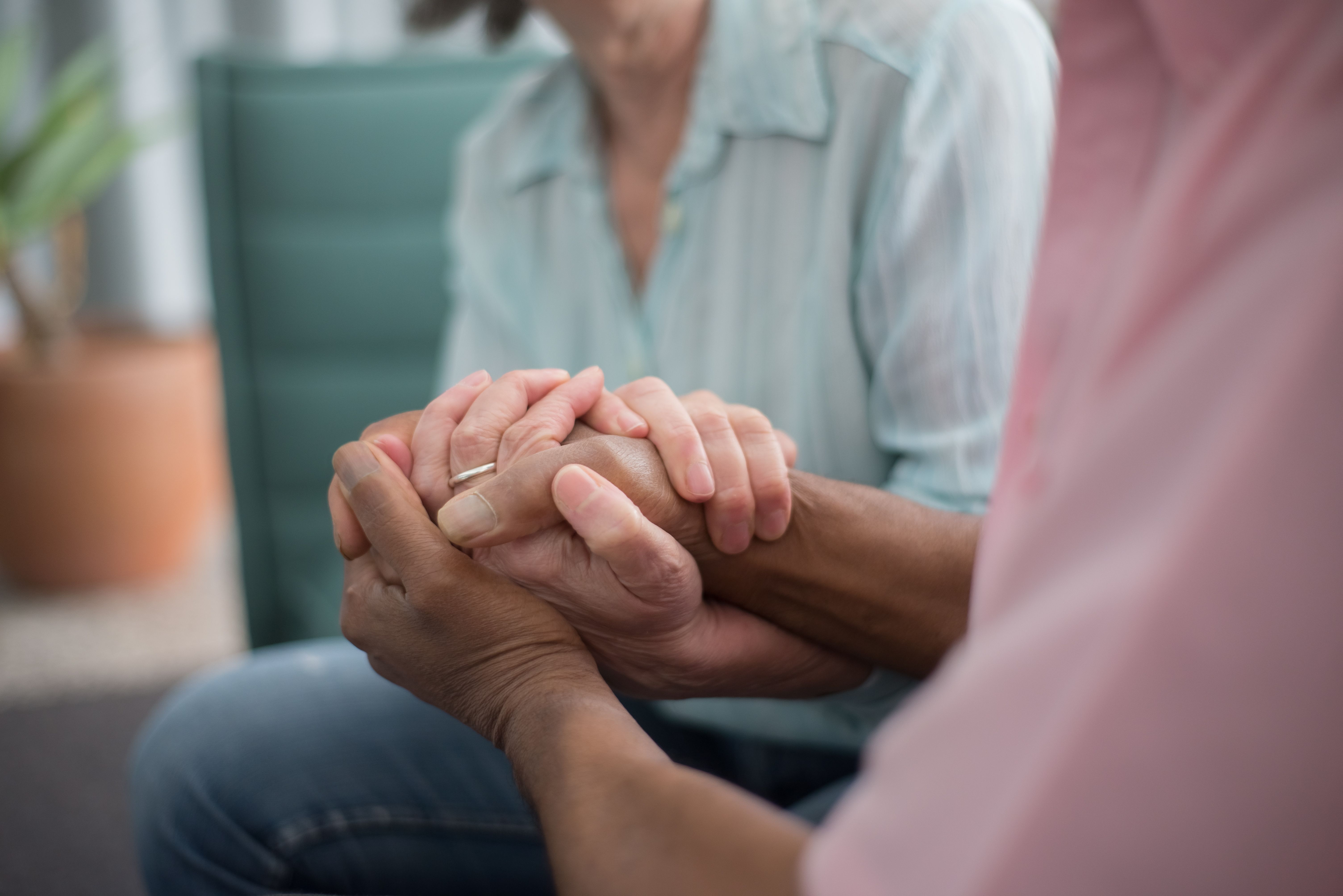 Caregiver supporting an older adult at home
